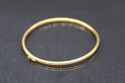 null Bracelet in 18k (750) yellow gold. 

Hallmarked charançon.

Weight : 5.48 g...