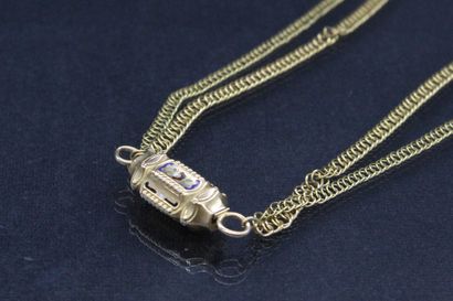 null Double row necklace in yellow gold, enamelled clasp. 

Marked with a horse's...