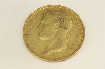 A gold coin of 40 francs Napoleon head, French...