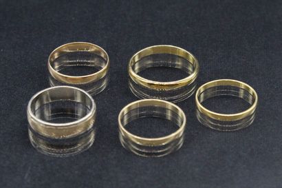 null Lot of five 18k (750) yellow and white gold wedding rings. 

Weight : 12.93...