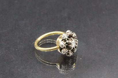 null 
Flower ring in 18k (750) yellow gold and silver (925) decorated with rose-cut...