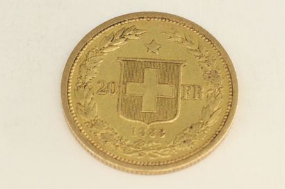 null Une pièce en or de 20 francs suisses " Tête Helvetia ".

1883 (x1).



Poids...