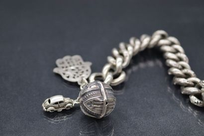 Silver bracelet (Boar) a bell and a hand...