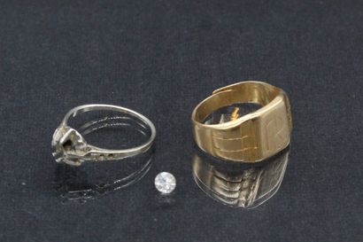 null 18k (750) yellow gold ring debris and a round diamond on paper. 

Weight of...