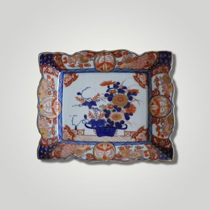 null Two earthenware dishes with Imari decoration. Japan 20th century:

- one with...