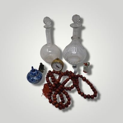 null KNICK-KNACKS HANDLE



Swiza gilt metal clock; Diorissimo spray bottle by Christian...