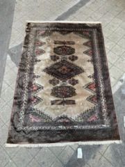 null IRAN

Wool and silk carpet with ivory background and decorated with three central...
