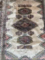 null IRAN

Wool and silk carpet with ivory background and decorated with three central...