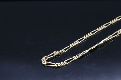 null Necklace in 18K (750) yellow gold with figaro link.

Around the neck : 44.5...