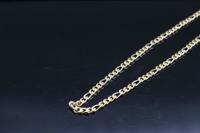 null Necklace in 18k (750) yellow gold with figaro link. 

Around the neck : 40 cm....