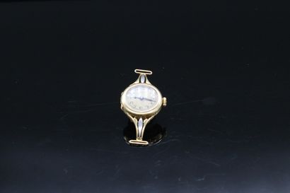 null Part of a watch in 18K (750) yellow gold.

Dial gold background, Arabic numerals...
