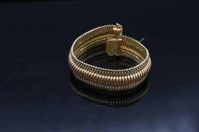null Bracelet en or jaune 18k (750) à maille tubogaz.

Poids : 26,12 g.