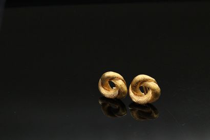 null Pair of ear clips in 18k (750) yellow gold. 

Weight : 10.85 g.