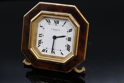 null CARTIER

Table clock making a shape alarm clock

octagonal form in gilded metal...