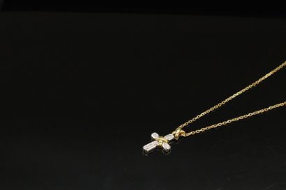 null Cross pendant in 18k (750) yellow and white gold paved with diamonds and a chain...