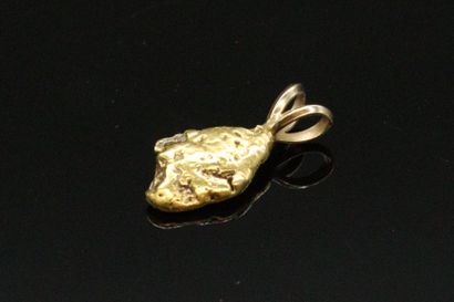 null Small gold nugget mounted in pendant.

Weight : 3.29 g : 3.29 g
