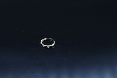 null Half wedding ring in 18K (750) yellow gold with four diamonds and four round...