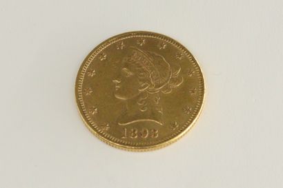 null Pièce en or de 10 dollars (1893).

Poids : 16.73 g.