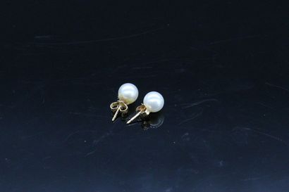 null Paire de clous d'oreille en or jaune 18K (750) sertis de perles.

Poids brut....