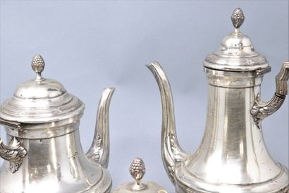 null Silver tea and coffee set including : 

- a teapot 

- a chocolate pot

- a...