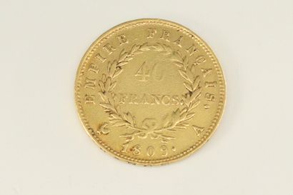 null Gold coin of 40 Francs Napoleon 1st laureate (1809 A).

Weight : 12,84 g.