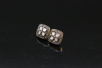 null Pair of vermeil ear studs of square shape each decorated with four irregular...