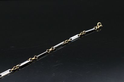 null Bracelet in 18K (750) yellow gold and steel.

Eagle head hallmark. 

Wrist size:...