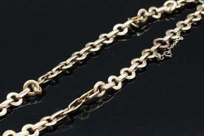 null Necklace in 18K (750) yellow gold and silver with round link.

Around the neck...