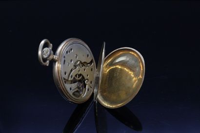 null Remains of a pocket watch in 18k (750) yellow gold. 

Gross weight : 67.29 ...