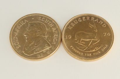 null Lot of 2 gold coins of 1 krugerrand; 

Weight : 67.80 g.