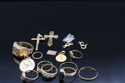 null Yellow gold scrap (various titles) including medals, rings.

A cross pendant...
