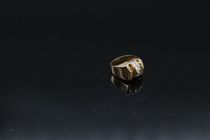 null 18k (750) yellow gold tank ring set with a line of small old cut diamonds. 

Finger...
