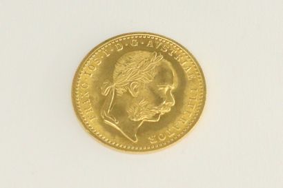 null Gold coin of a ducat François Joseph (1915).

Weight : 3,49 g.