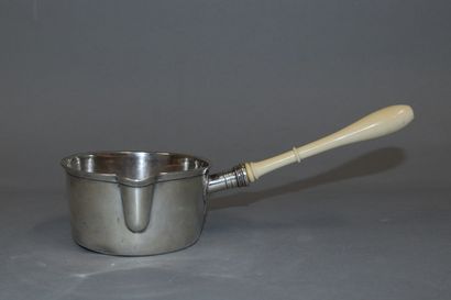 null Small silver pan (950), the handle in ivory; engraved with a monogram 

French...