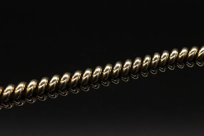 null Bracelet demi-torsade d'or 18K (750) gris. 

Longueur : 18,5 cm environ. - Poids...