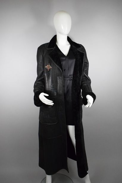 KENZO 
Circa 2008 
 
Leather coat with two...