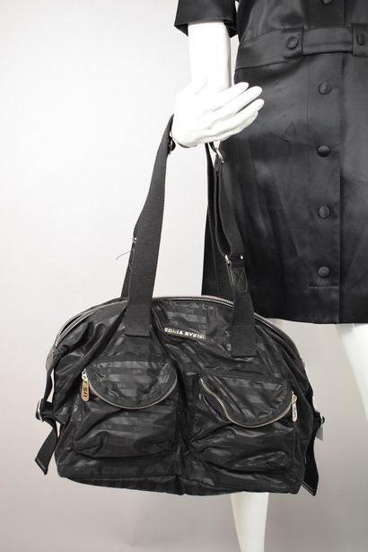 null SONIA RYKIEL



Set of two black bags in black fabric, one quilted with the...