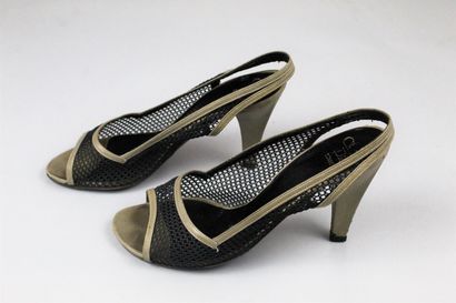null CHRISTIAN DIOR SOULIERS (circa 1975)



Pair of taupe leather and black fishnet...