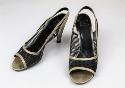 null CHRISTIAN DIOR SOULIERS (circa 1975)



Pair of taupe leather and black fishnet...