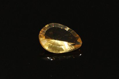 null Concave pear cut citrine on paper. 

Weight : 2.73 cts.
