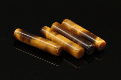 null Double pairing of tiger eye stick size. 

4 pieces

Weight : 18.15 cts.