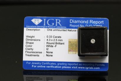 null Diamant "white F" rond sous-scellé.

Accompagné d'un certificat de l'IGR indiquant...