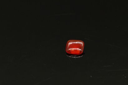 null Carnelian cabochon on paper. 

Weight : approx. 2.30 cts.