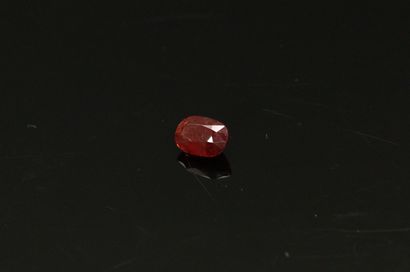 null Oval ruby on paper. 

Weight : 2.56 cts.