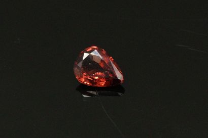 null Red spinel pear on paper. 

Weight : 1.15 cts.