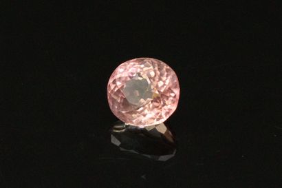 null Pink tourmaline oval on paper. 

Weight : 1.75 cts.