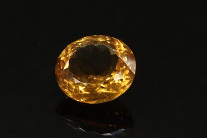 null Oval citrine on paper. 

Weight : 18.59 cts.