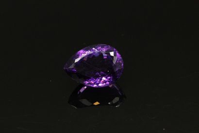 null Pear amethyst on paper. 

Weight : 26.31 cts.