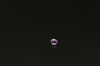 null Oval amethyst on paper. 

Weight : approx. 0.45 cts.