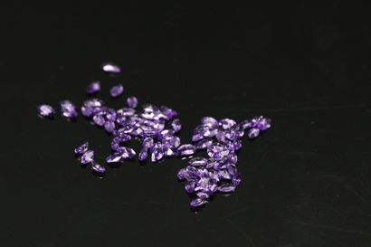 null Lot of marquise cut amethysts on paper. 

80 pieces approx. 

Total weight :...